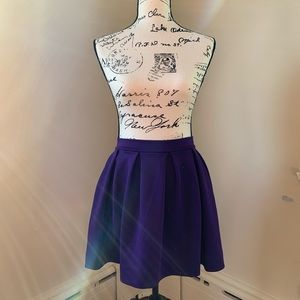 High waisted purple skirt.